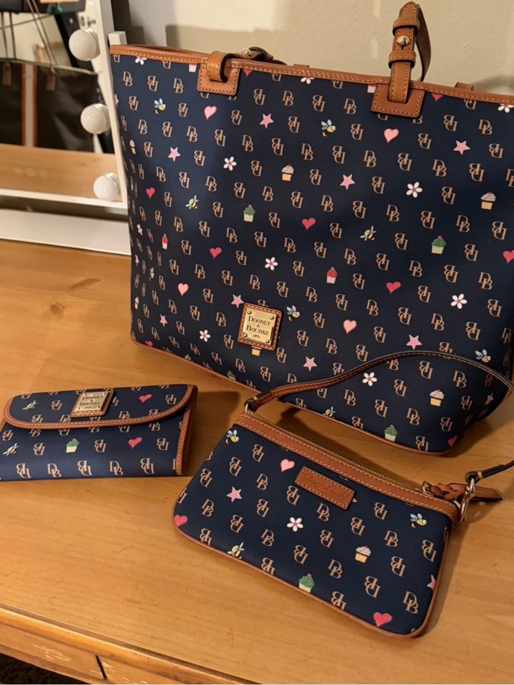 Dooney & Bourke Gretta Novelty Tote  with Navy Multicolor Icon Print /Tan trim
